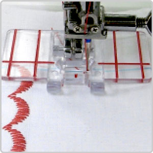 The Janome Border Guide Foot in use